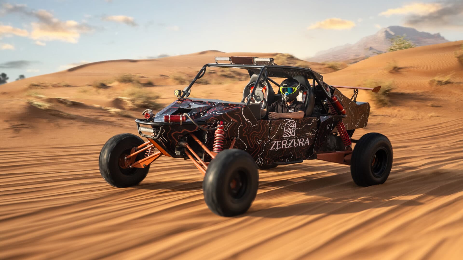 Zerzura Desert Fox buggy crossing the dunes in Mleiha