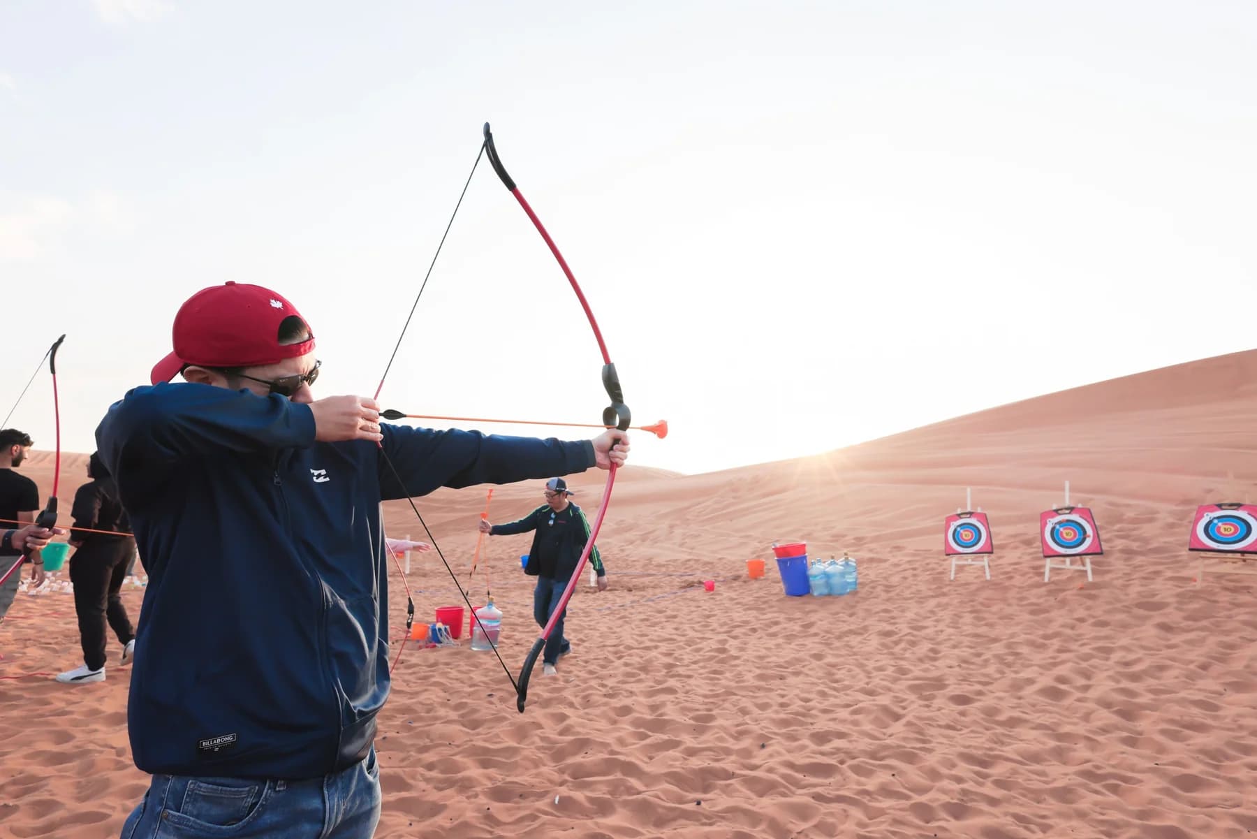 A guest taking aim during a supervised soft-archery activity