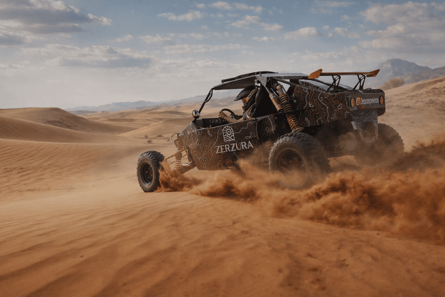 Dune buggy driver enjoying off road adventure in Mleiha desert Sharjah