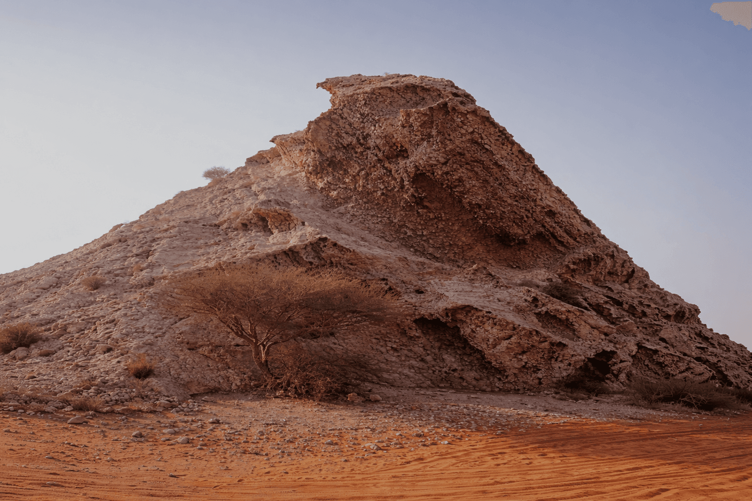 Fossil Rock landmark in Mleiha desert Sharjah near Zerzura dune buggy adventure route